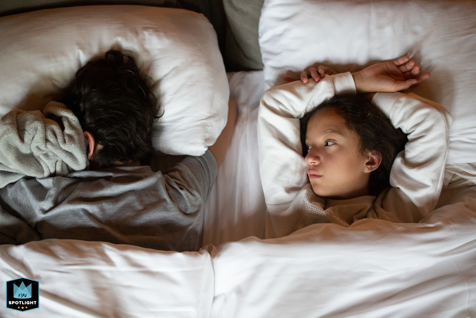 Rising and Restless: A Family's Morning Ritual in Bustling Mexico City Morning routine in Mexico City: siblings start the day with sleepy eyes.