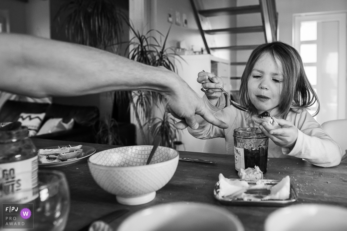 Photo by: <a href="https://www.fpja.com/documentary-family-photography-contests/nadine-court/savoie/2099332">Nadine Court - France</a> Savoie Breakfast scene during day in the life photo session in Auvergne-Rhone-Alpes