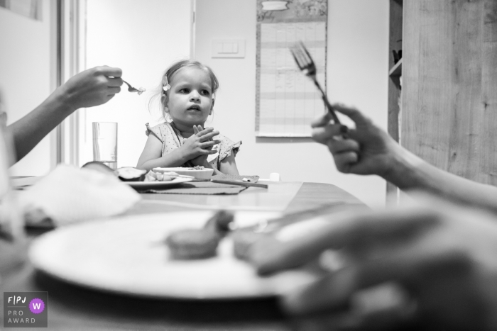 Slovenia Meal time with special diet for child. | Ljubljana family photography session in the home.