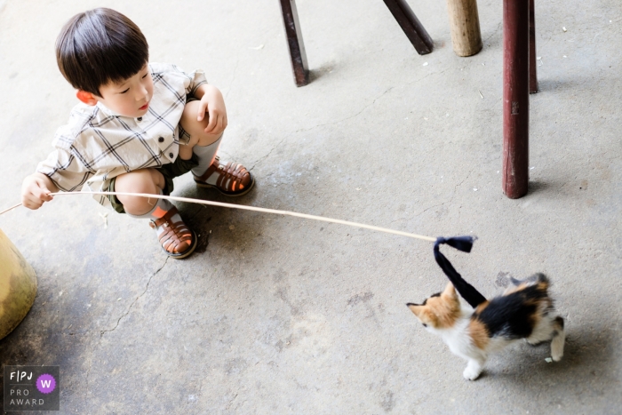 Photo by: <a href="https://www.fpja.com/documentary-family-photography-contests/mango-gu/hangzhou-city/2099565">Mango Gu - China</a> Mango Gu is a family photographer from