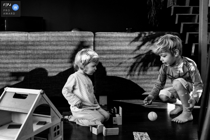 Photo by: <a href="https://www.fpja.com/documentary-family-photography-contests/ruth-wytinck/east-flanders/2100335">Ruth Wytinck - Belgium</a> Flanders documentary family photos of kids playing with toys | East Flanders day in the life photographer