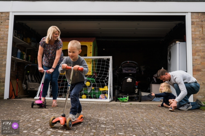 Young girl upset as Mum wanted a go on the scooter ride. | Lancashire family photography