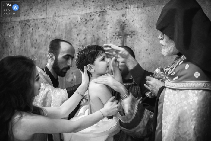 Photo by: <a href="https://www.fpja.com/documentary-family-photography-contests/albert-buniatyan/armenia/2101220">Albert Buniatyan - Armenia</a> Baptism ceremony in Armenia, Echmiadzin church