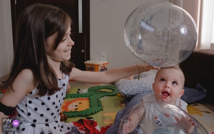 Cuiabá baby photography session with older sister.