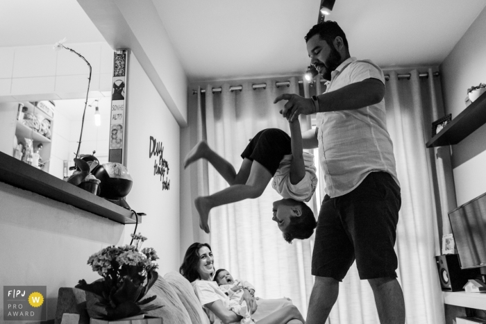 Photo by: <a href="https://www.fpja.com/documentary-family-photography-contests/ivete-siqueira-da-franca-bueno/sao-paulo/2101844">Ivete Siqueira da Franca Bueno - Brazil</a> Father playing with his son in the living room | Sao Paulo Family Session
