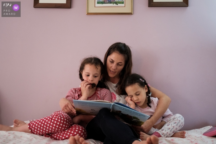 Gloucestershire England Family Photography Session at Night - Girl falls asleep during bedtime stories