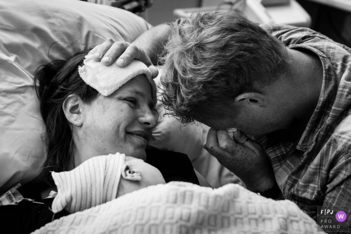 Photo by: <a href="https://www.fpja.com/documentary-family-photography-contests/marjolein-roossien/groningen/2102061">Marjolein Roossien - Netherlands</a> Groningen family photos - Netherlands baby delivery photography - emotions after hard work