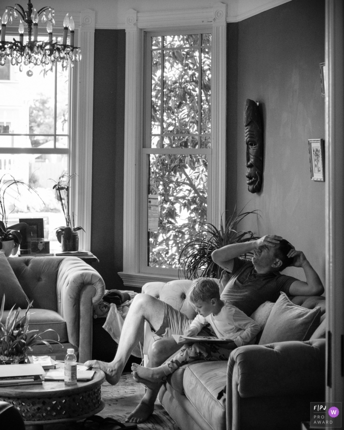 San Francisco	California family photography - A tired father helps his son learn to read.