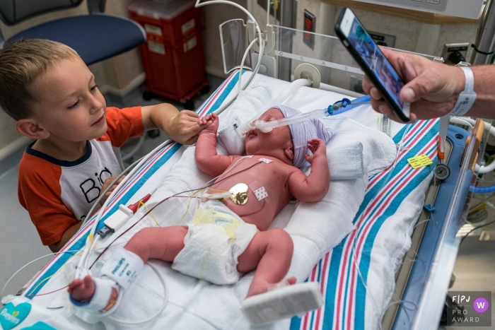 Connecticut Brothers meet for the first time, while mom, bedridden looks on via FaceTime at Hartford Hospital