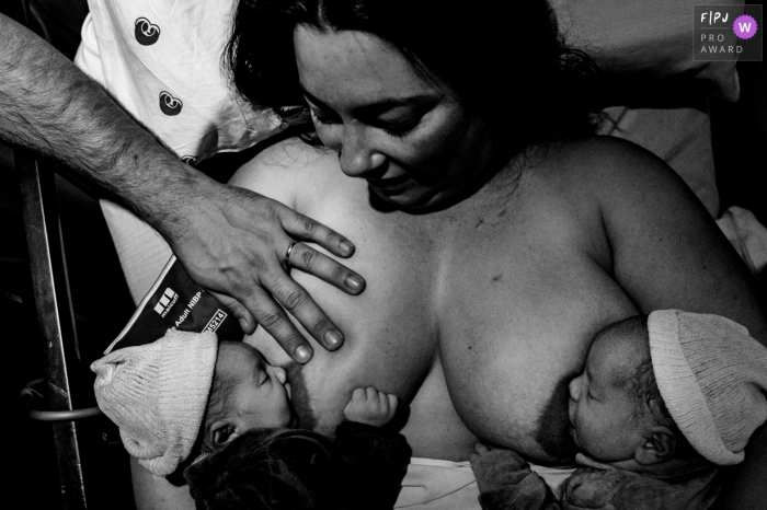 Photo by: <a href="https://www.fpja.com/documentary-family-photography-contests/rafael-rosa/rio-grande-do-sul/2104258">Rafael Rosa - Brazil</a> Rio Grande do Sul Brazil new mother nursing twins in the hospital