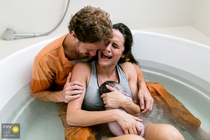 Sao Paulo Brazil mother and father after the pain of baby delivery is peace and love at Hospital e Maternidade São Luiz