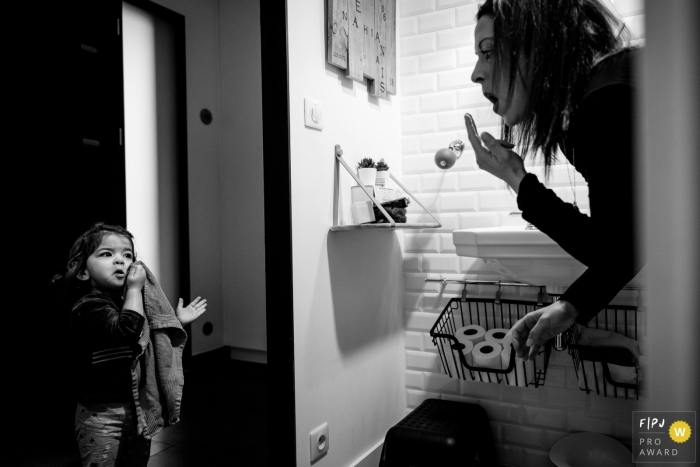 Photo by: <a href="https://www.fpja.com/documentary-family-photography-contests/sybil-rondeau/nantes/2103950">Sybil Rondeau - France</a> Nantes Loire-Atlantique young girl mirroring her mother