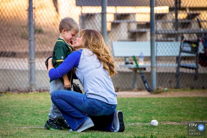 Photo by: <a href="https://www.fpja.com/documentary-family-photography-contests/loren-haar/ventura/2104170">Loren Haar - United States</a> Ventura California young boy is learning how hard the baseball is