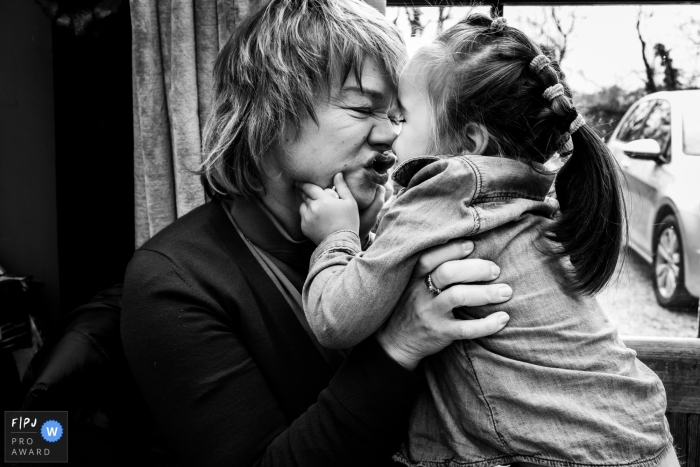 Kent England Granddaughter squishes her Grandma's face 