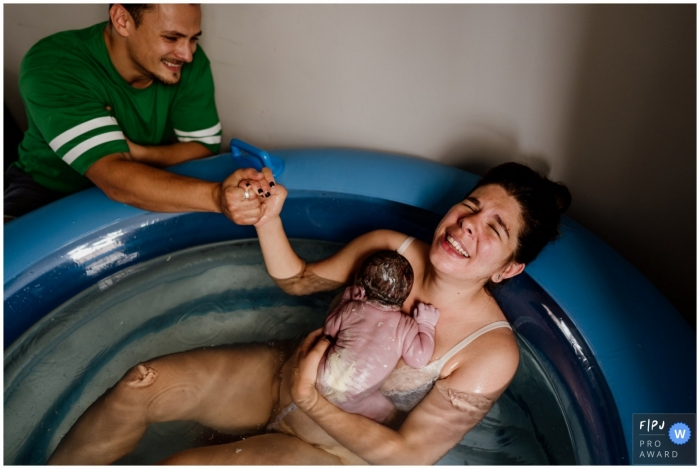 Photo by: <a href="https://www.fpja.com/documentary-family-photography-contests/sharron-gibson/buckinghamshire/2105204">Sharron Gibson - United Kingdom</a> Buckinghamshire England - That pure relief of having given birth. At home birth photography.