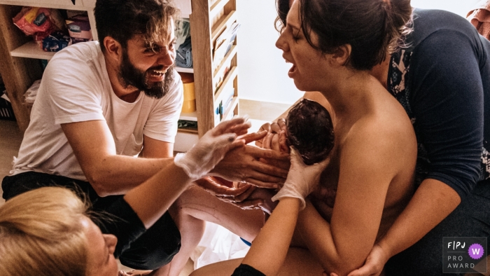 Sao Paulo Brazil birth photography baby in hospital with mom and dad.