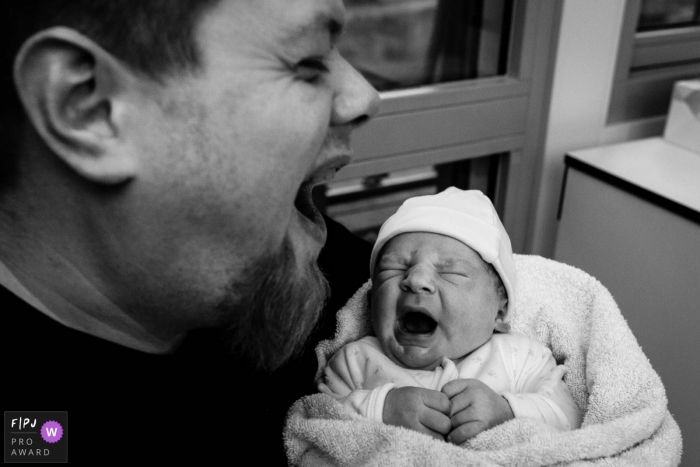 Photo by: <a href="https://www.fpja.com/documentary-family-photography-contests/marjolein-roossien/groningen/2105460">Marjolein Roossien - Netherlands</a> Synchronized yawning by dad and baby at the Marini Ziekenhuls | Groningen Birth Photographer