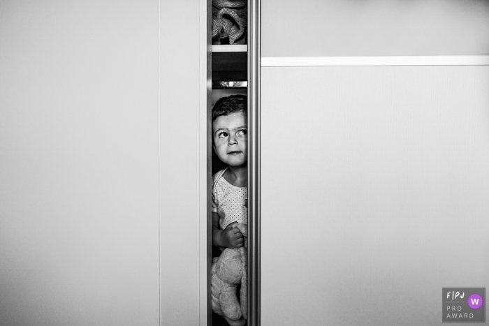 County Durham England family photo showing that Hiding in cupboards is so much fun when you're 3 County Durham England family photo showing that Hiding in cupboards is so much fun when you're 3