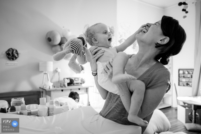 Photo by: <a href="https://www.fpja.com/documentary-family-photography-contests/sybil-rondeau/nantes/2109234">Sybil Rondeau - France</a> Nantes toddler and family image session in the home of mom and young son having some fun in France