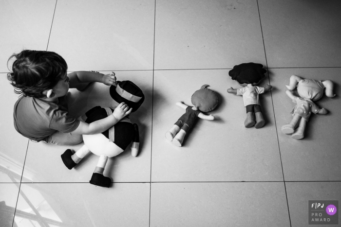 MG toddler pictures from an at-home photo shoot of the children and the master toy organizer MG toddler pictures from an at-home photo shoot of the children and the master toy organizer