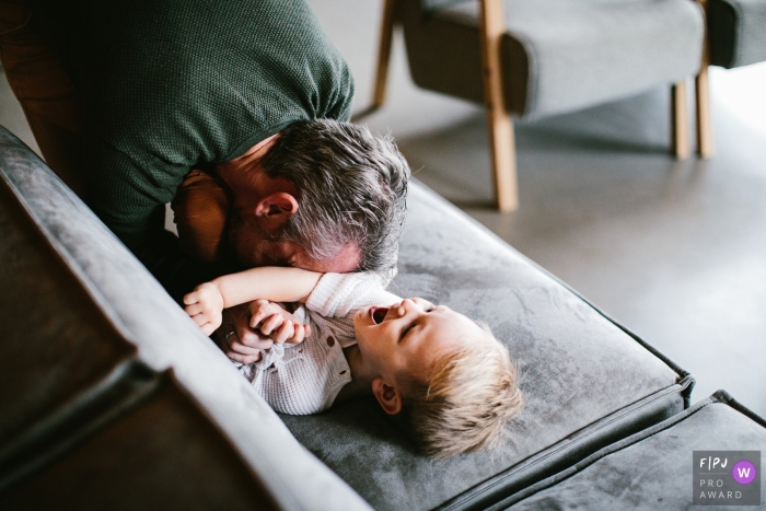Photo by: <a href="https://www.fpja.com/documentary-family-photography-contests/jolanda-boer/drenthe/2109982">Jolanda Boer - Netherlands</a> NL fun family/child image shoot in the home of a moment between dad and son