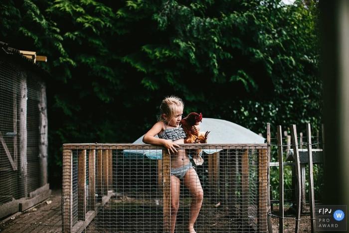 NL family photography in the backyard with chickens during the pandemic in the summer of 2020 NL family photography in the backyard with chickens during the pandemic in the summer of 2020