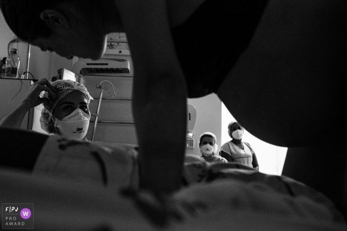 Sao Paulo hospital documentary birth photography showing the team work involved