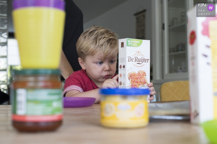 Photo by: <a href="https://www.fpja.com/documentary-family-photography-contests/linda-huvenaars/drenthe/2111280">Linda Huvenaars - Netherlands</a> Netherlands Day in the Life documentary family photo showing When mum is catching you in the act of tasting the goodies