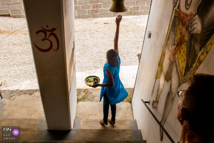 Moment driven Hesse family photojournalism image of a Girl at the temple Moment driven Hesse family photojournalism image of a Girl at the temple