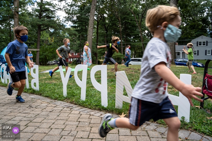 Moment-driven Connecticut family photography capturing a Pandemic birthday party