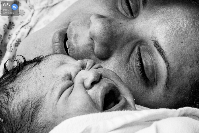 Hospital e Maternidade Santa Lúcia birth photo captured as a close up of the mother and baby Hospital e Maternidade Santa Lúcia birth photo captured as a close up of the mother and baby