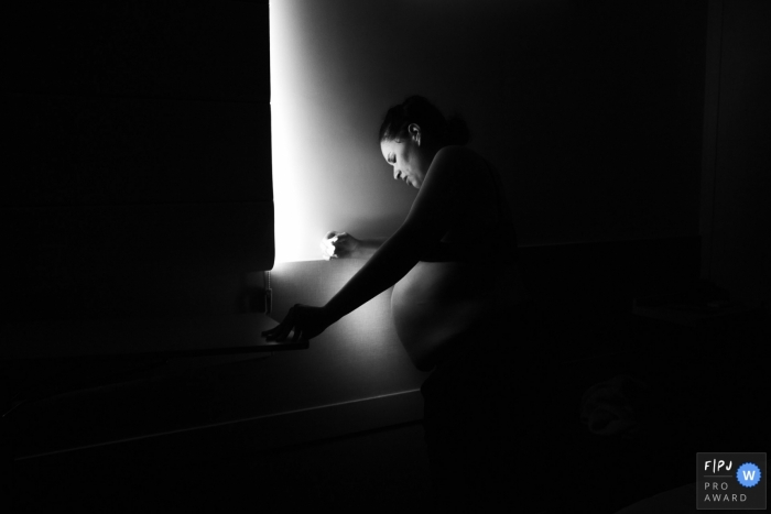 Maternidade Santa Helena photo coverage of a mother looking for a quiet moment during her contractions Maternidade Santa Helena photo coverage of a mother looking for a quiet moment during her contractions