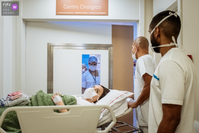 A Rio de Janeiro documentary birth photographer captured this Mother going to surgery at the Perinatal hospital unit A Rio de Janeiro documentary birth photographer captured this Mother going to surgery at the Perinatal hospital unit