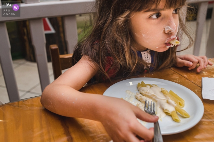 Photographie de famille Campo Grande d'une pause pour manger à la fête