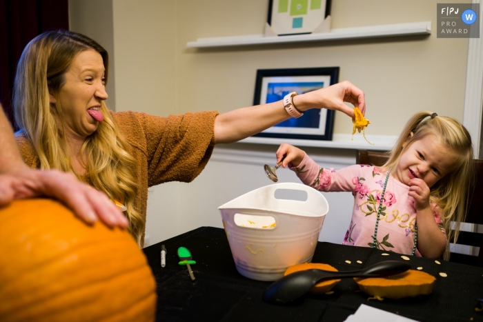 Photo by: <a href="https://www.fpja.com/documentary-family-photography-contests/benjamin-lipford/atlanta/2116058">Benjamin Lipford - United States</a> An Atlanta documentary family photographer chronicled a Mother taunting her daughter with pumpkin guts in her face