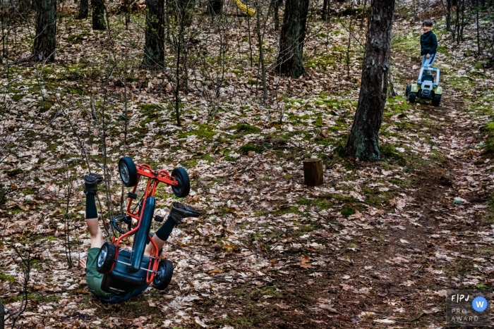 Awarded documentary family picture from Limburg of a pedal cart accident in the woods on a trail