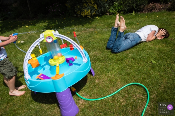 Documentary England family photography showing playtime during the school Summer holidays