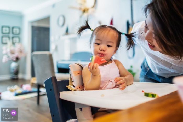 Family documentary photography in San Francisco with a Baby girl enjoying the yummy watermelon Family documentary photography in San Francisco with a Baby girl enjoying the yummy watermelon