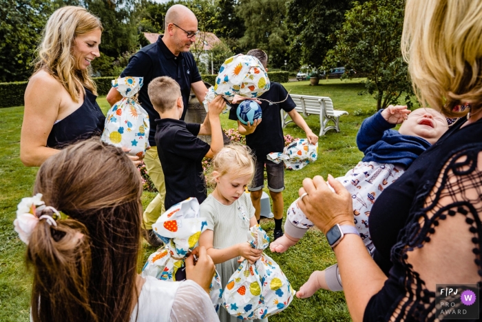 outdoor party on the grassy park scene in Dusseldorf, Everyone gets a present At an outdoor party on the grassy park scene in Dusseldorf, Everyone gets a present at this North Rhine-Westphalia event