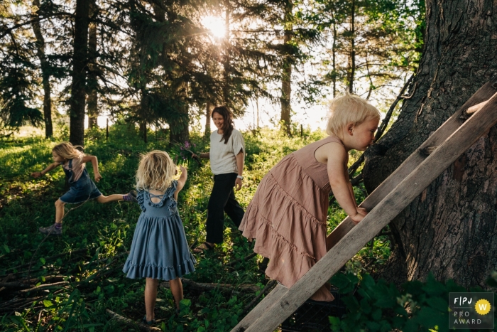 A Madison Wisconsin mom and three girls are all in their own space and going their own direction A Madison Wisconsin mom and three girls are all in their own space and going their own direction