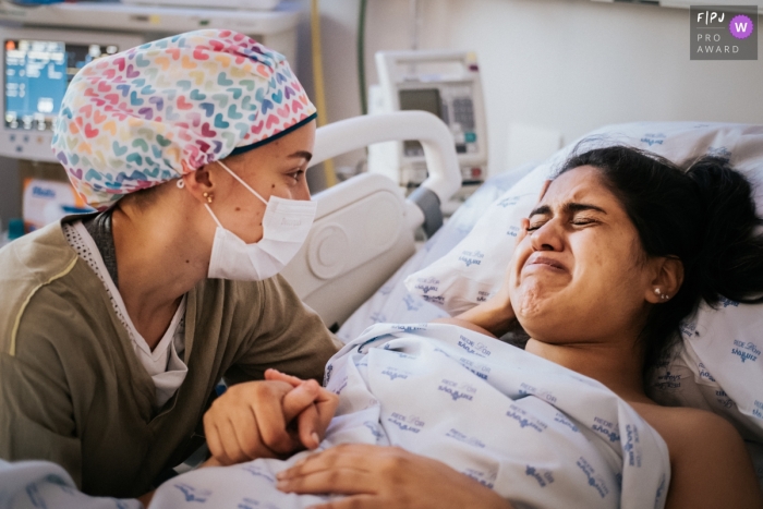At Maternidade São Luís Anália Franco in Brazil, she joyfully shed tears of celebration for her newborn child She joyfully shed tears of celebration for the birth of her child at Maternidade São Luís Anália Franco in Brazil