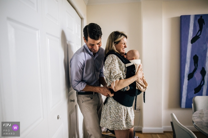 Before going out for a walk, the family gathered and prepared their baby equipment The family in Maryland packed their baby gear, before going out for a walk